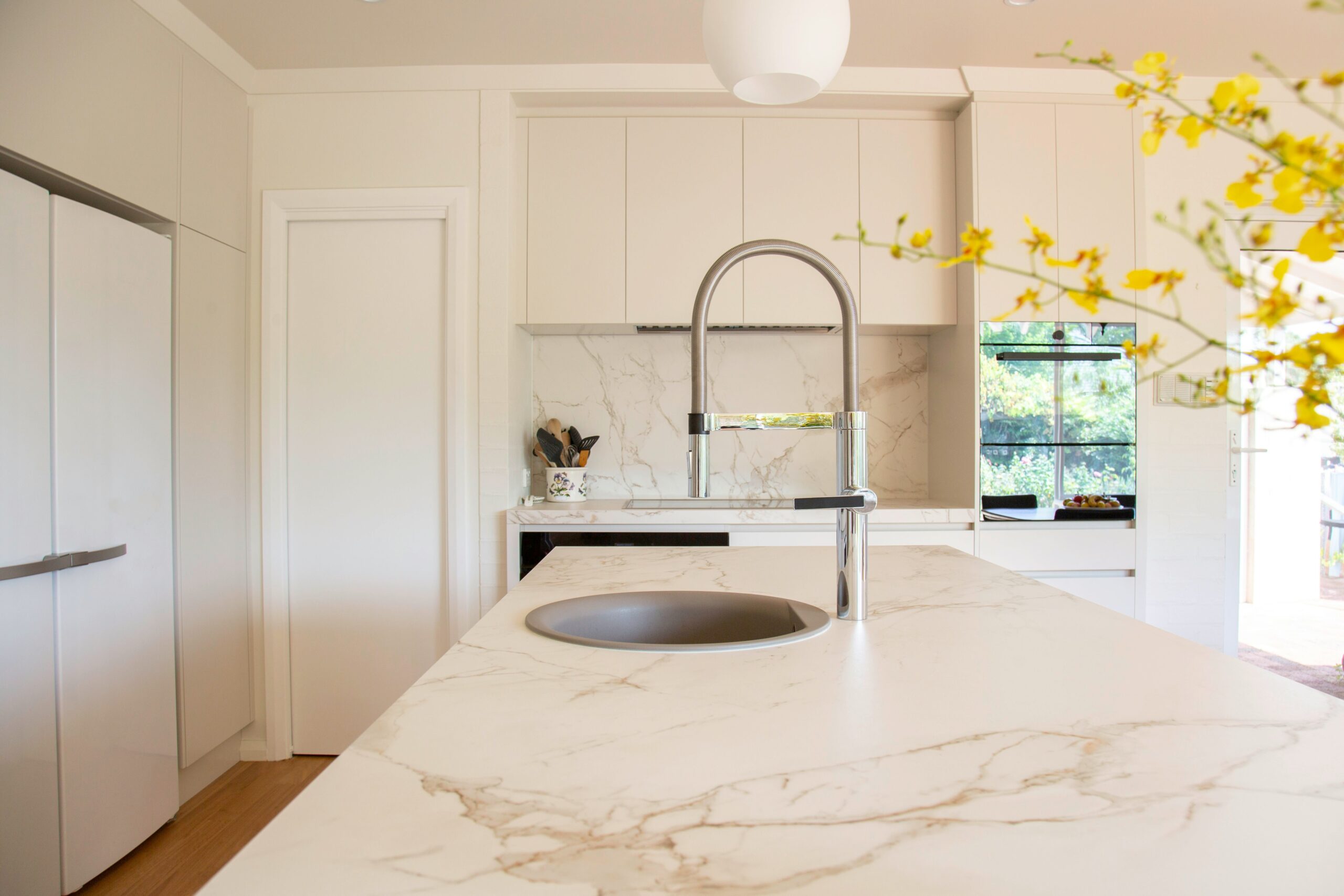 Refined kitchen interior with warm stone details